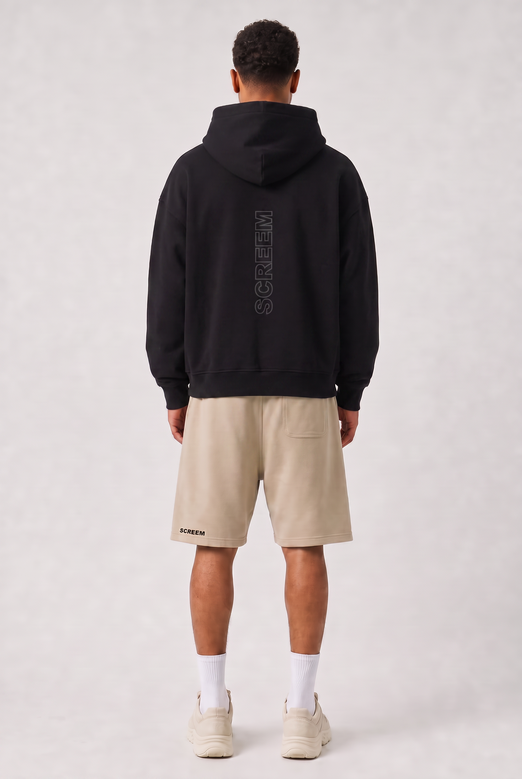 Model wearing SCREEM Full-Zip Hoodie, black, back view